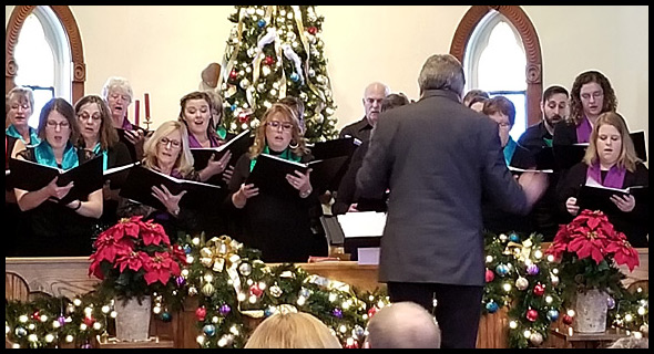 Todd Kasenberg conducts the Joyful Voices community choir